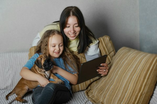 What are the most effective methods for socializing a young Shiba Inu with other pets?